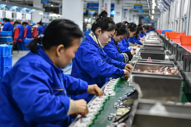 China’s Industrial Production Surges, but Property Sector Remains a Concern