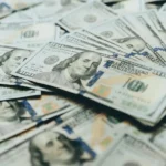 Dollar Slides to Multi-Month Lows as Markets Brace for Historic Fed Rate Cut Amid Unprecedented Political Pressure