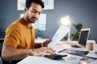 Illustration of money growing through investments and passive income streams, with charts, coins, and assets symbolizing wealth building and financial growth over time.