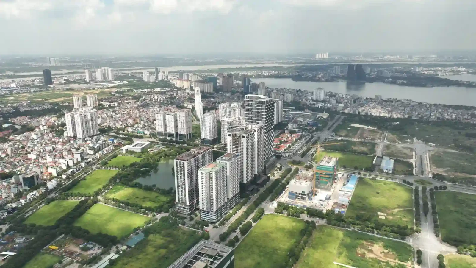 Vietnam housing market transformation with urban skyline and construction growth, illustrating major reforms driving a significant shift in real estate and investment opportunities.