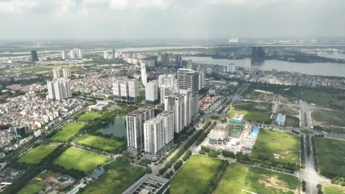 Vietnam housing market transformation with urban skyline and construction growth, illustrating major reforms driving a significant shift in real estate and investment opportunities.