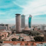Africa real estate market growth illustrated with urban skylines, construction projects, and investment charts, highlighting a $347 billion boom and a proven opportunity for investors.