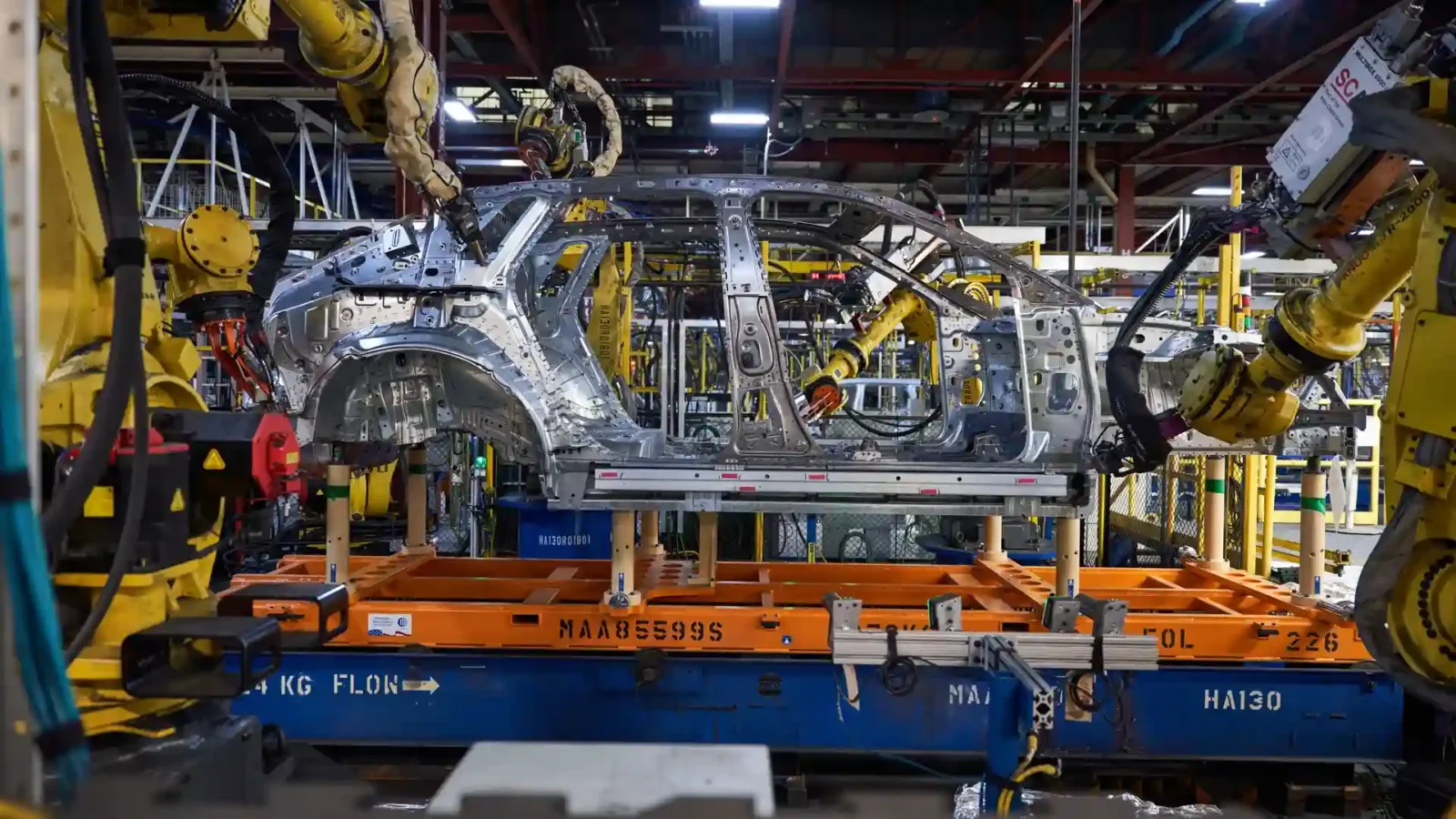 General Motors idling its flagship electric vehicle factory, with halted production lines and EV models, highlighting a strategic shift amid slowing demand and changing market conditions.