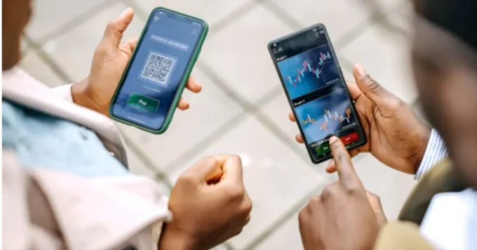 Illustration of mobile money growth with smartphones, digital wallets, and rising revenue charts, showing why 80% of providers are now profitable through scale, transaction volumes, and fintech innovation.