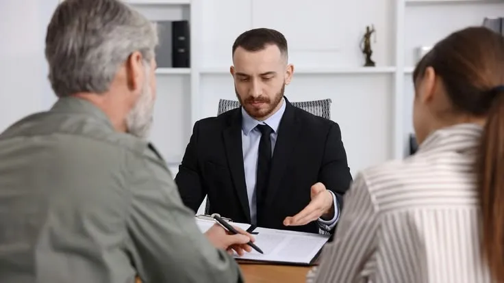 Professional guidance in estate planning showing legal and financial advisors assisting with will writing, asset structuring, and inheritance planning