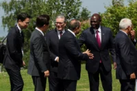 G7 leaders announce a debt relief pledge aimed at easing global financial pressures and supporting vulnerable economies facing rising debt burdens