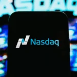 The U.S. stock market shows divergence as the Nasdaq Composite Index falls 1% while other major indexes perform differently