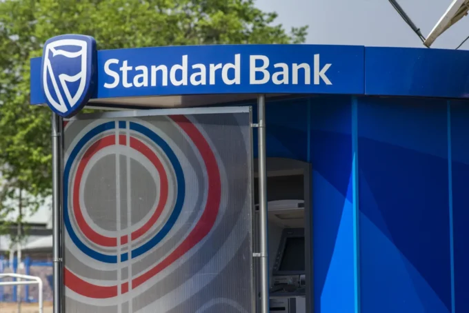 Angola raises $228 million as the Standard Bank stake sale surges, highlighting banking investment, equity markets, capital raising, and Angola’s financial sector