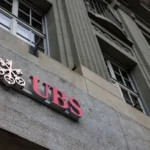 UBS sees two Fed rate hikes in 2026 after a jobs surge, highlighting U.S. interest rates, Federal Reserve policy, employment data, inflation, and financial markets