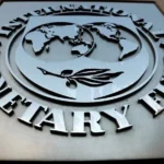 IMF warns that global economic resilience masks rising debt risks, highlighting sovereign debt, fiscal pressures, financial stability, and global economic outlook