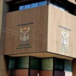 South Africa cuts government bond auctions as debt payments rise, highlighting sovereign borrowing, public debt servicing costs, fiscal pressure, and bond markets